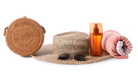Beach accessories and bottle of sunscreen on white backgroundの写真素材