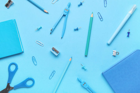 Composition with different stationery on blue backgroundの写真素材