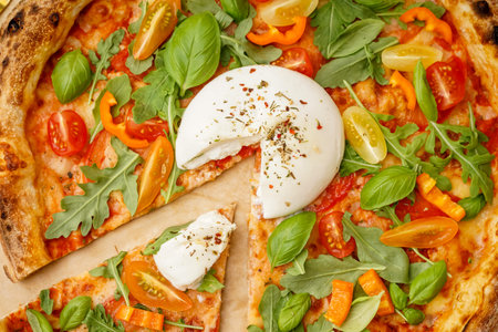 Tasty pizza with Burrata cheese on tableの写真素材