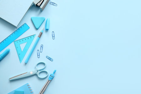 Different school stationery on blue backgroundの写真素材