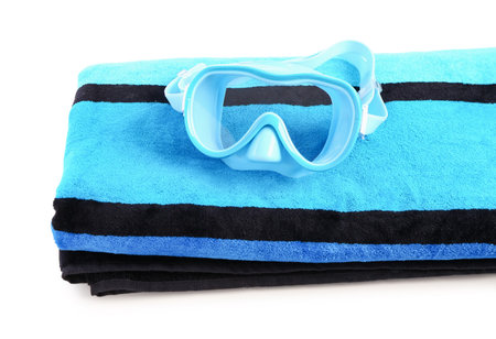 New swimming mask and towel on white backgroundの写真素材