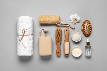 Composition with different bath supplies and cosmetic products on gray backgroundの写真素材