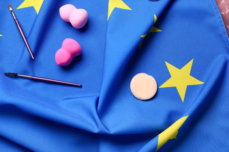 Makeup brushes and sponges on flag of European Unionの写真素材