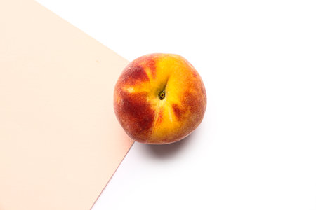 Sweet peach on colorful backgroundの写真素材