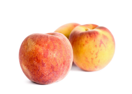 Sweet peaches on white backgroundの写真素材