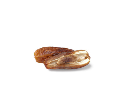 Dried dates on white background
