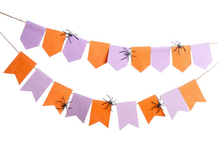 Garlands made of paper flags and spiders for Halloween celebration on white backgroundの写真素材