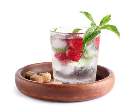 Glass of fresh raspberry lemonade with mint on white backgroundの写真素材