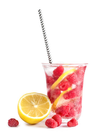 Glass of fresh raspberry lemonade on white backgroundの写真素材