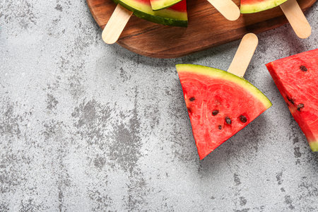 Sweet watermelon sticks on blue backgroundの写真素材
