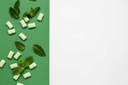 Fresh chewing gums with mint on colorful backgroundの写真素材