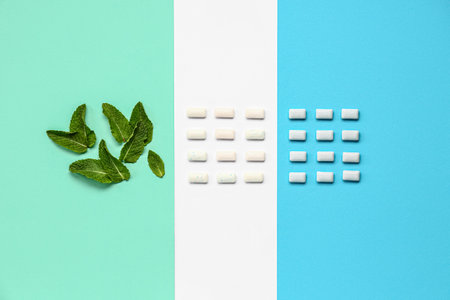 Fresh chewing gums with mint on colorful backgroundの写真素材