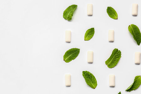Fresh chewing gums with mint on white backgroundの写真素材