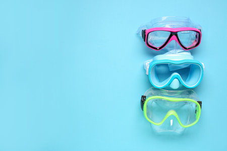 Different swimming masks on blue backgroundの写真素材