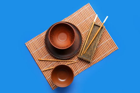 Chinese table setting on blue backgroundの写真素材