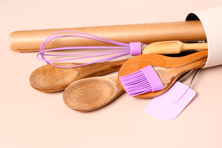 Baking utensils on beige backgroundの写真素材