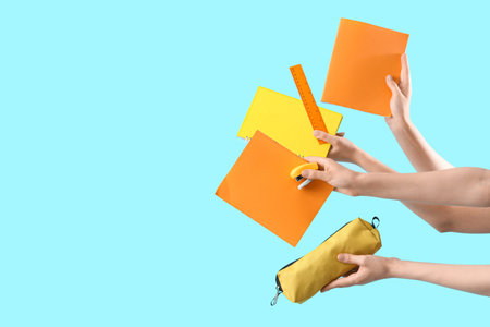 Many female hands with different stations on blue backgroundの写真素材