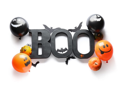 Halloween balloons and decor on white background