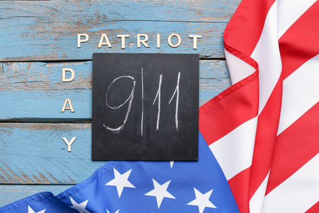 USA flag and card with date of National Day of Prayer and Remembrance for the Victims of the...
