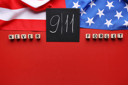 USA flag and card with date of National Day of Prayer and Remembrance for the Victims of the...