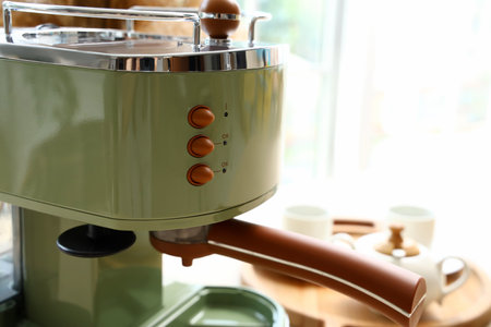 Modern electric coffee machine in kitchen, closeupの写真素材
