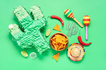 Composition with Mexican symbols and food for Independence Day on green backgroundの写真素材