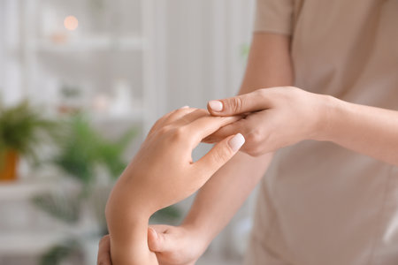 Young woman having massage in spa salon, closeupの写真素材