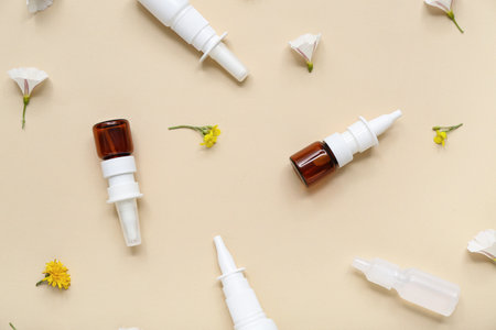 Nasal drops with flowers on beige backgroundの写真素材