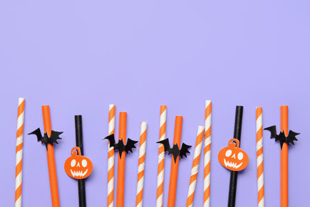 Set of different drinking straws for Halloween celebration on color background, closeupの写真素材