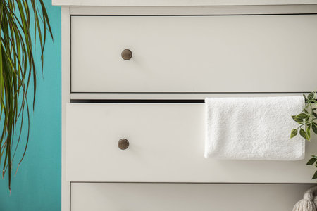 Opened drawer with clean towel, closeupの写真素材