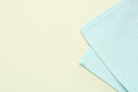 Clean folded napkin on color backgroundの写真素材