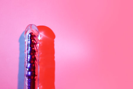 Vibrator from sex shop on red background, closeupの写真素材