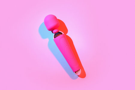 Vibrator from sex shop on red backgroundの写真素材