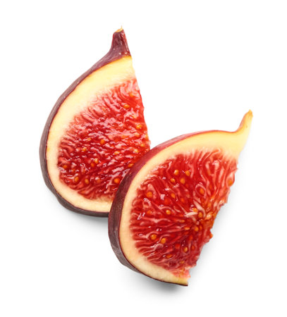 Slices of ripe fresh fig isolated on white backgroundの写真素材