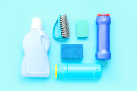 Set of cleaning supplies on blue backgroundの写真素材