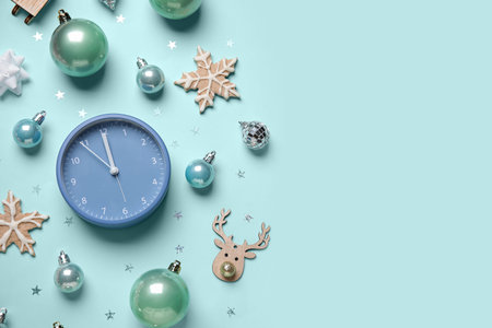 Composition with alarm clock, Christmas decorations and cookies on color background