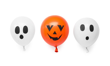 Different funny Halloween balloons on white backgroundの写真素材