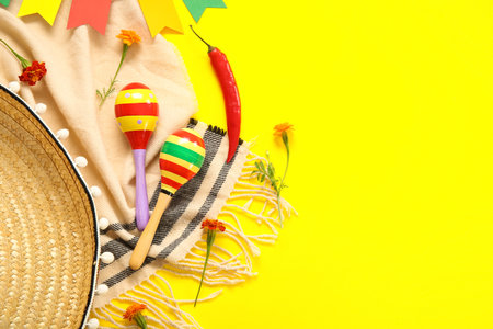 Composition with Mexican symbols for Independence Day on yellow background