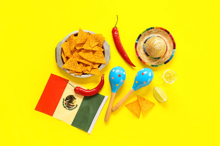 Composition with food and Mexican symbols for Independence Day on yellow background