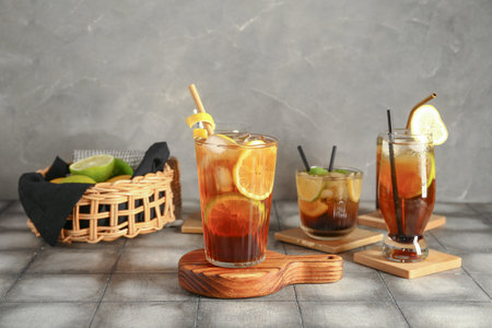 Glasses of cold Long Island iced tea on tableの写真素材