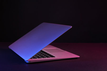 Modern laptop on black backgroundの写真素材