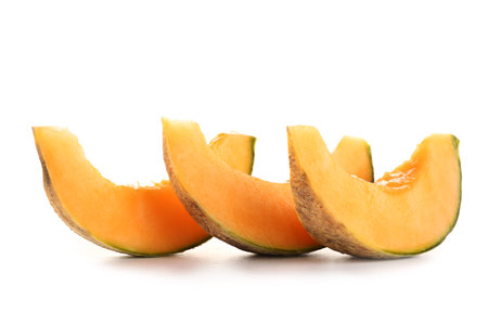 Pieces of sweet melon on white backgroundの写真素材