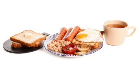 Plate with tasty English breakfast and cup of tea on white background