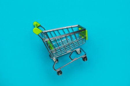 shopping cart on blue backgroundの写真素材