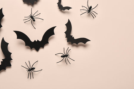 Paper bats and spiders for Halloween party on light backgroundの写真素材