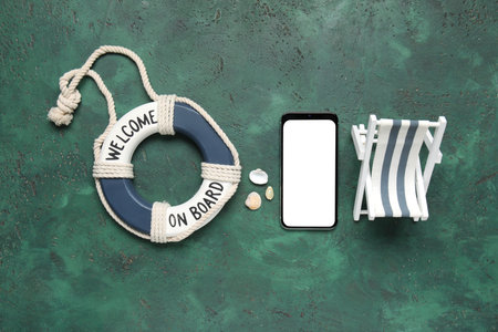 Composition with modern mobile phone and toy beach accessories on color background