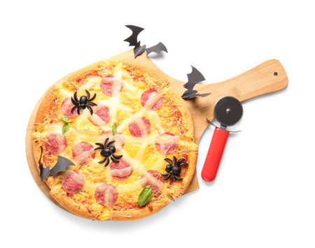 Wooden board with tasty pizza for Halloween celebration on white backgroundの写真素材