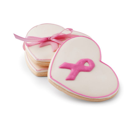 Cookies in shape of heart with ribbons isolated on white background. Breast cancer awareness conceptの写真素材