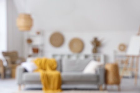Blurred view of living room with sofaの写真素材