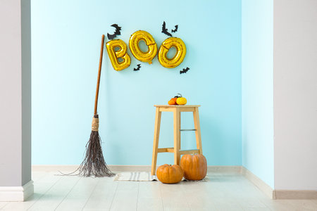 Word BOO made of balloons with paper bats in roomの写真素材